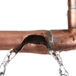 Photo of a leaking copper pipe